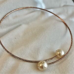 Spring Neckpiece flexible,off white Pearl like stone head.Classy and fashionable